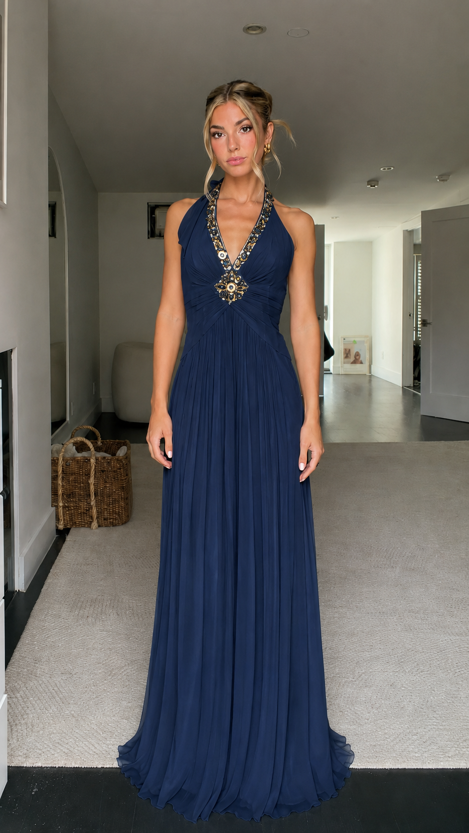 Front view of navy beaded halter pleated maxi dress