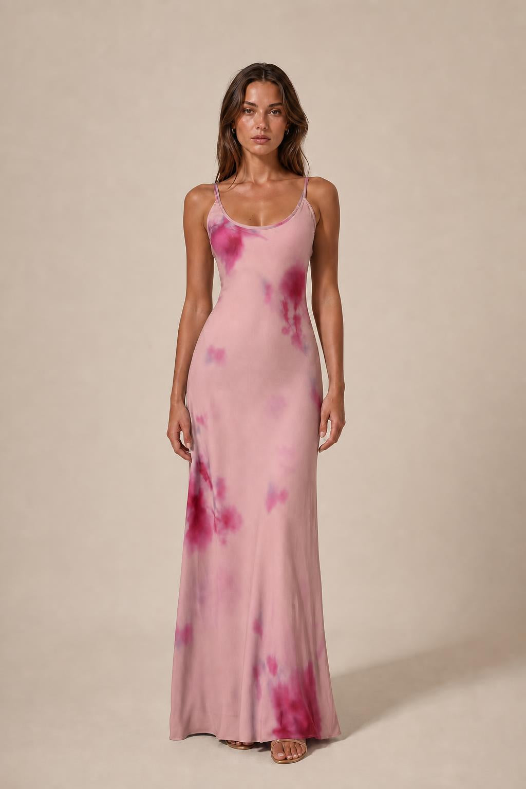 Model wearing pink tie-dye cami slip maxi dress
