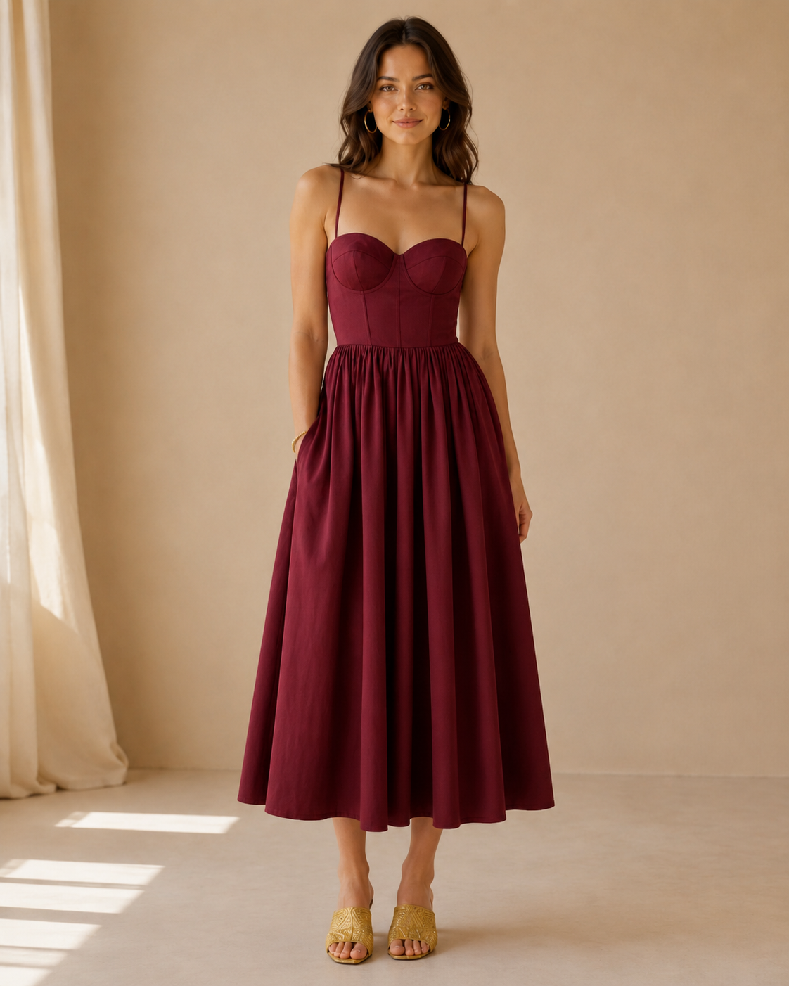 Burgundy sweetheart midi dress with slim straps front view