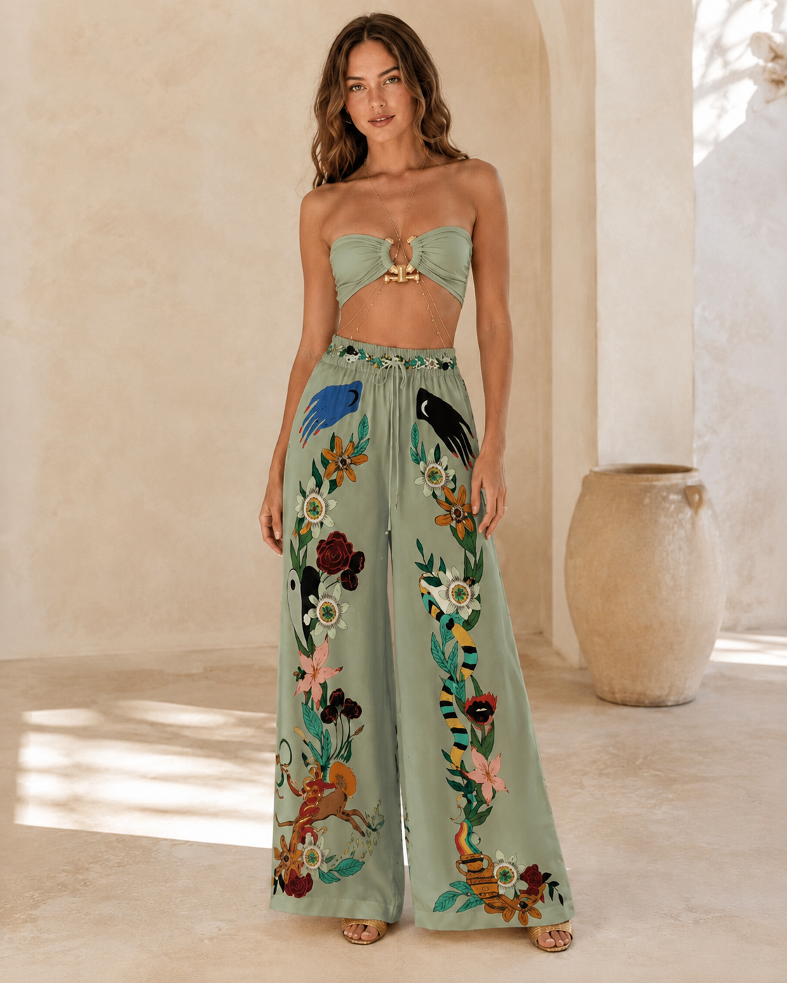Front view of sage bandeau top and matching floral printed wide-leg pants set