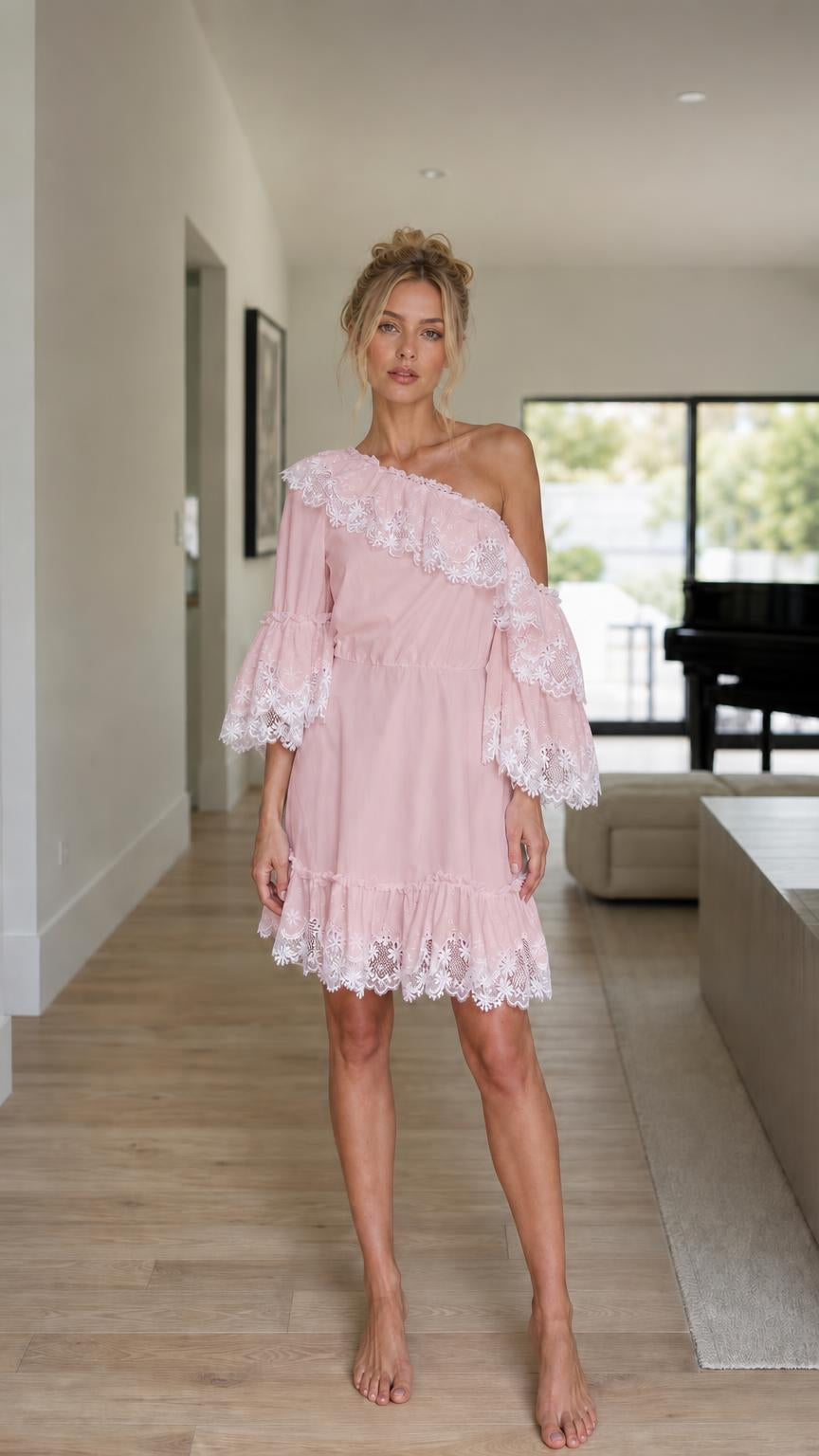 Front view of model wearing pink one-shoulder ruffle lace mini dress