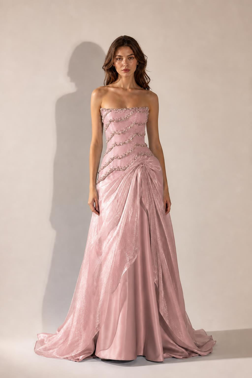 Front view of Pink strapless beaded evening gown