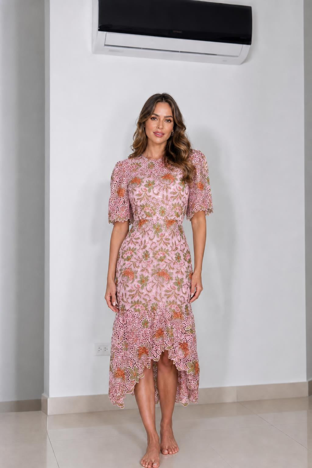 Front view of pink floral lace midi dress