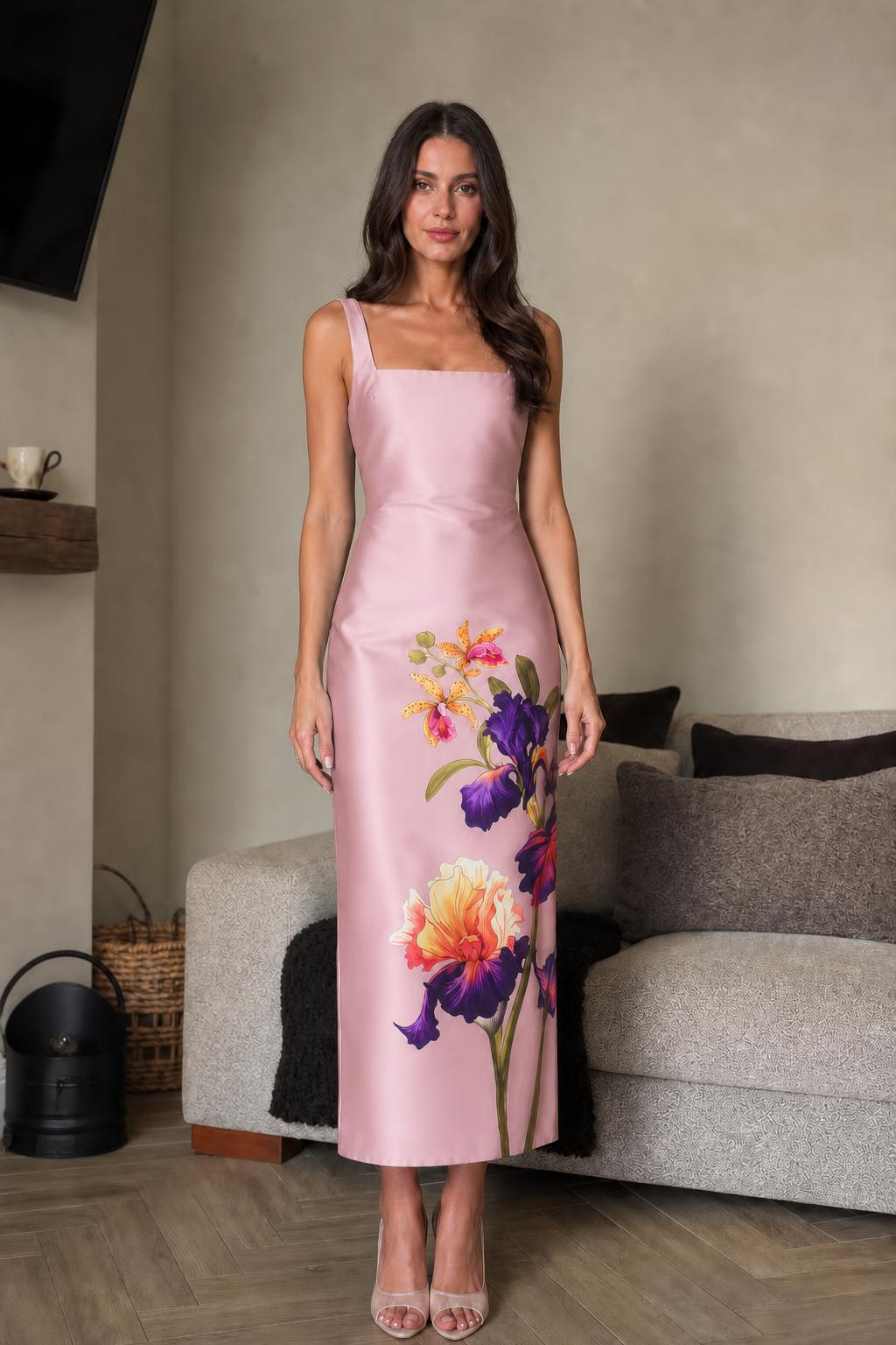 Front view of pink floral midi dress on model