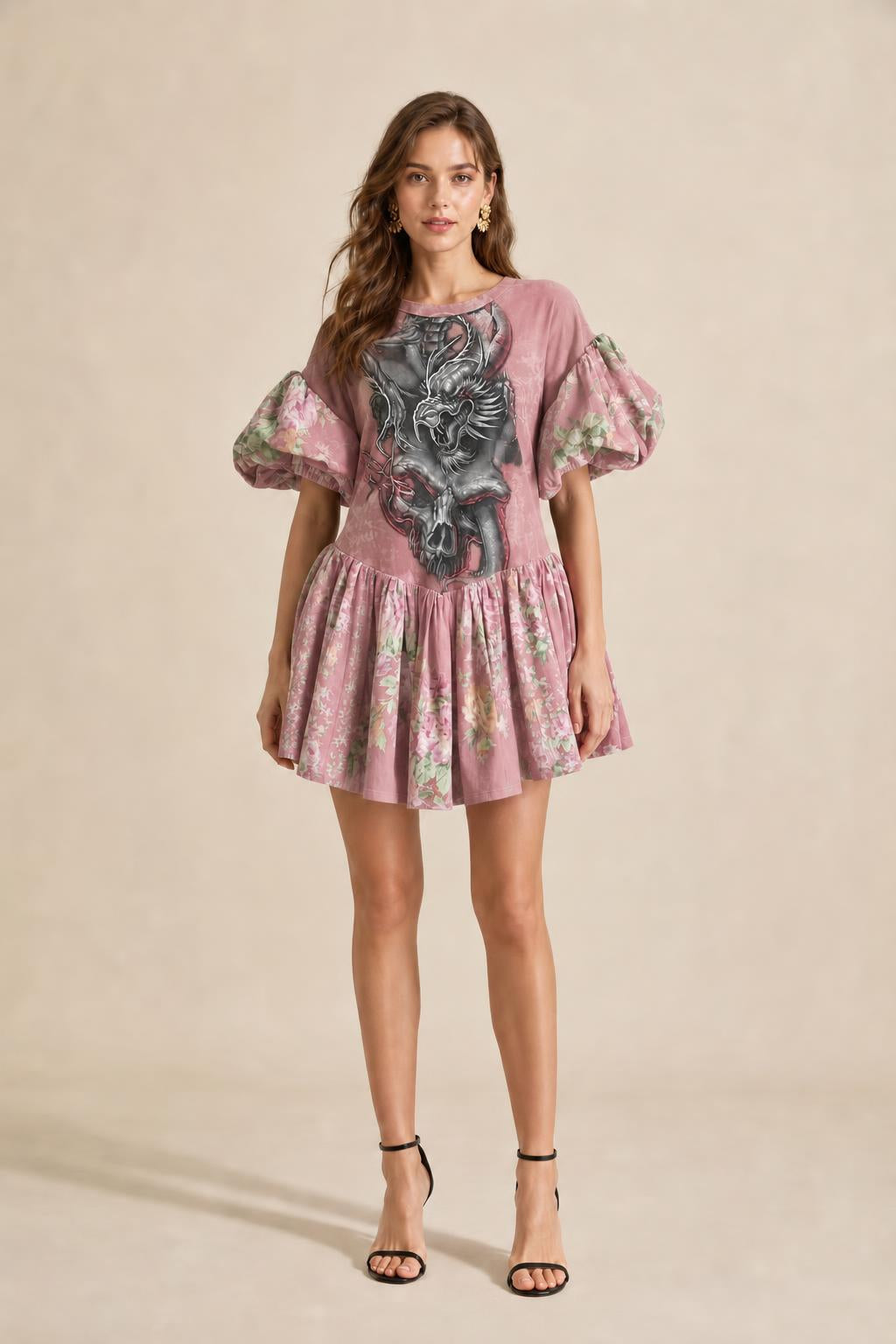 Model wearing pink color variant of graphic puff sleeve mini dress