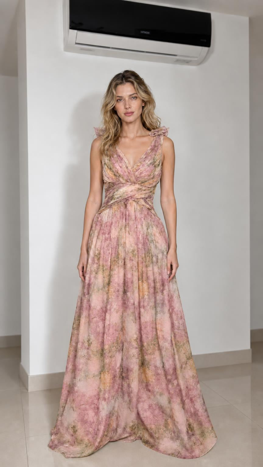 Model wearing pink floral print ruffle strap dress