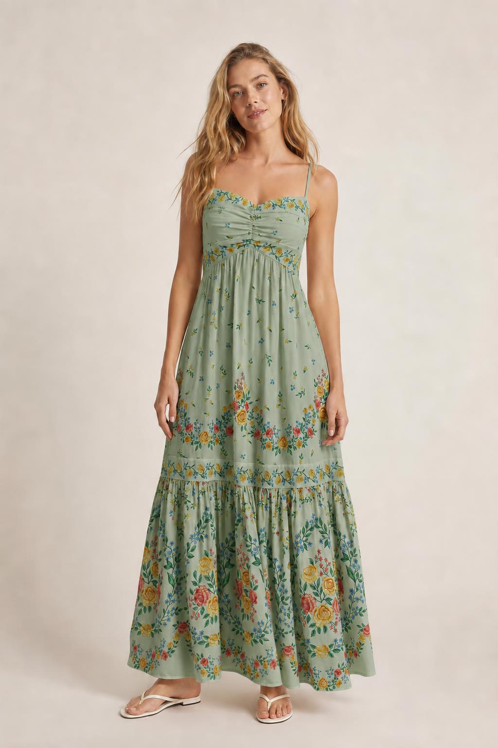 Front view of sage floral maxi dress on model
