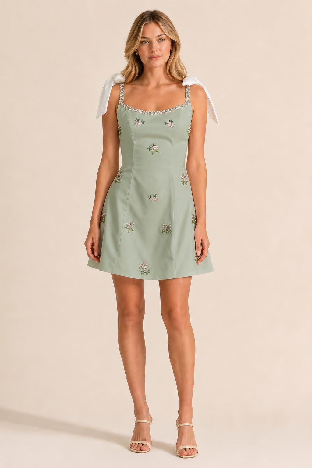 Front view of sage embellished mini dress