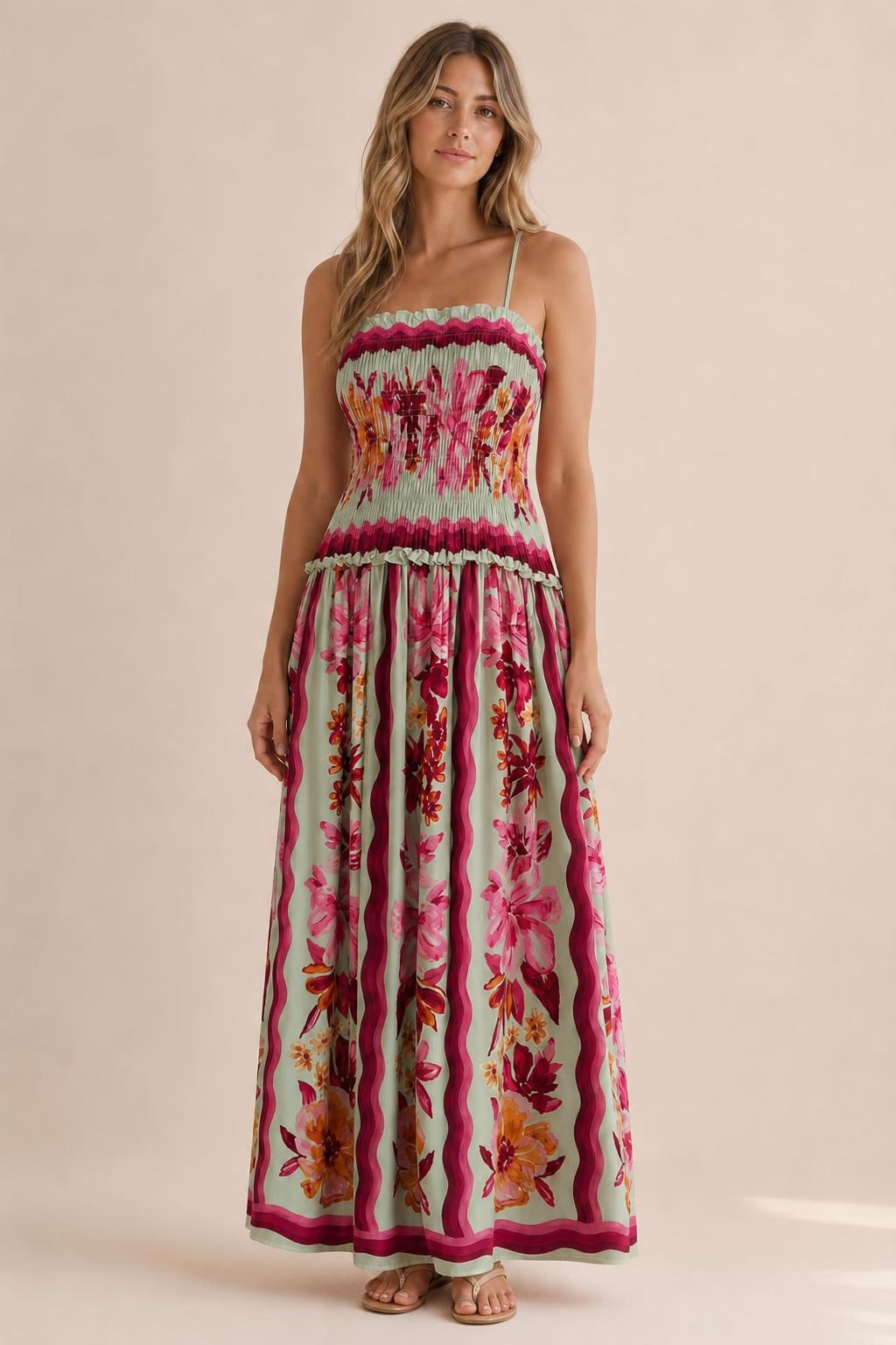 Front view of floral print smocked maxi dress in sage