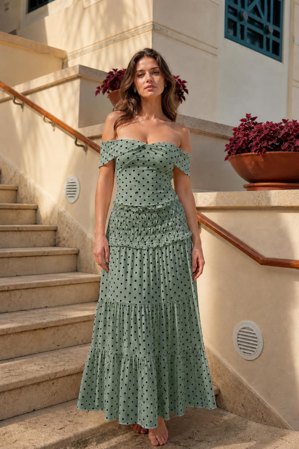 Model wearing sage green polka dot off-the-shoulder maxi dress