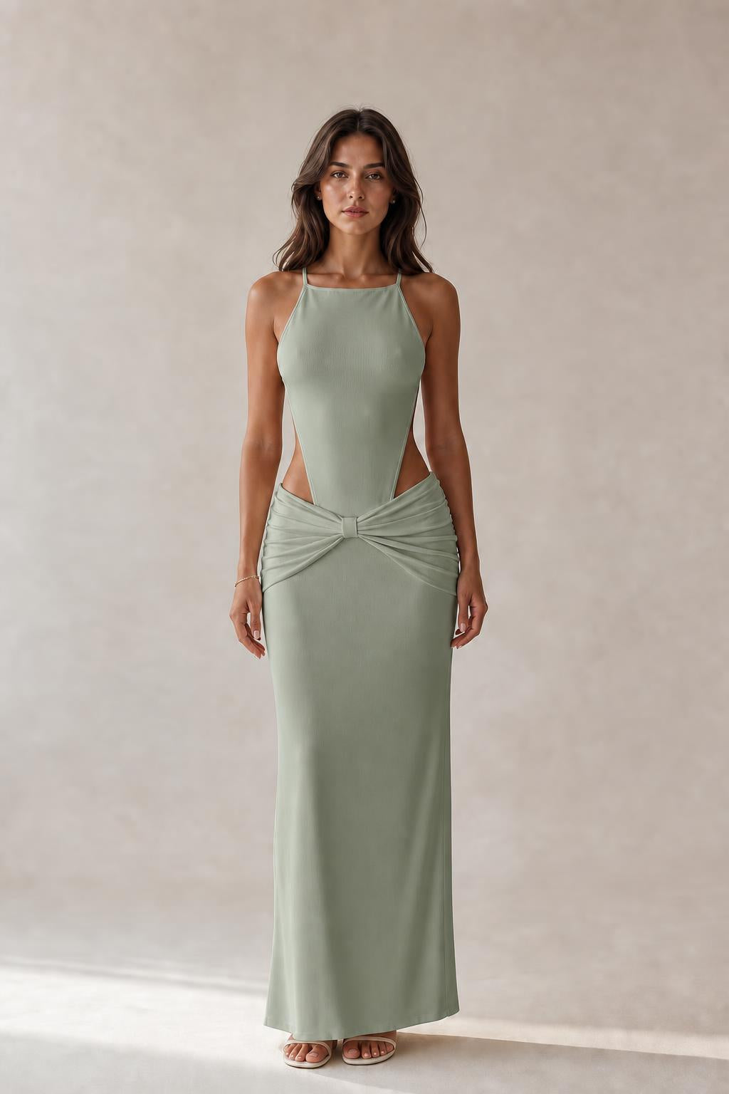 Model wearing sage cut-out ruched maxi dress