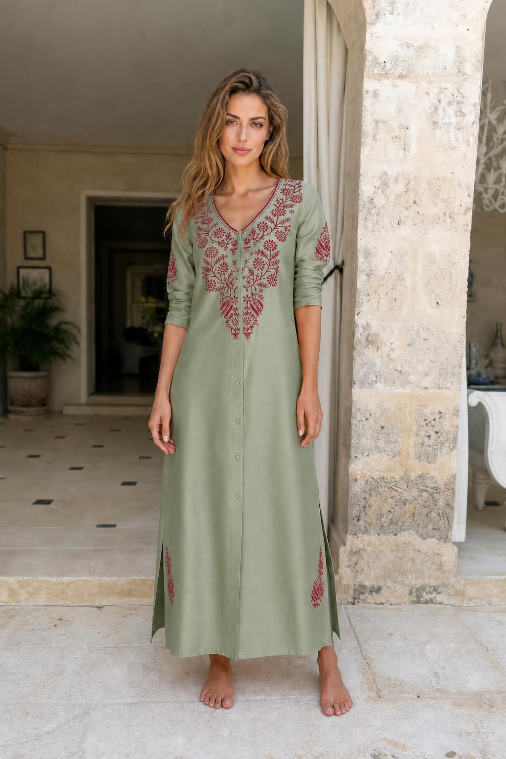 Model wearing sage green embroidered maxi dress