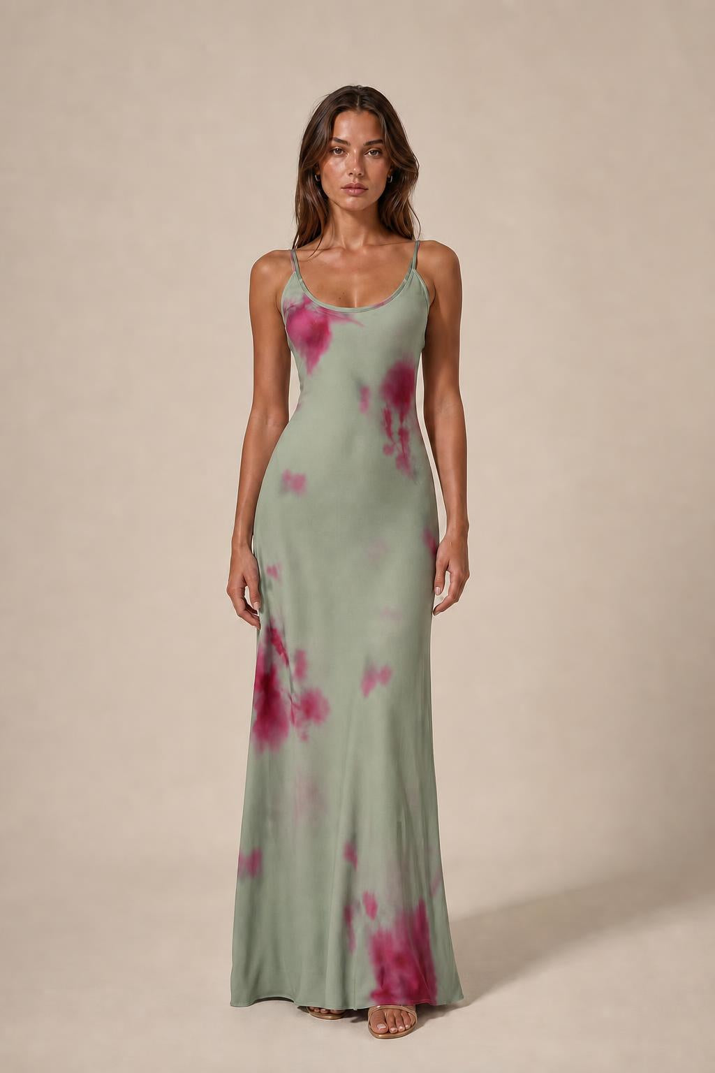 Model wearing sage green tie-dye cami slip maxi dress