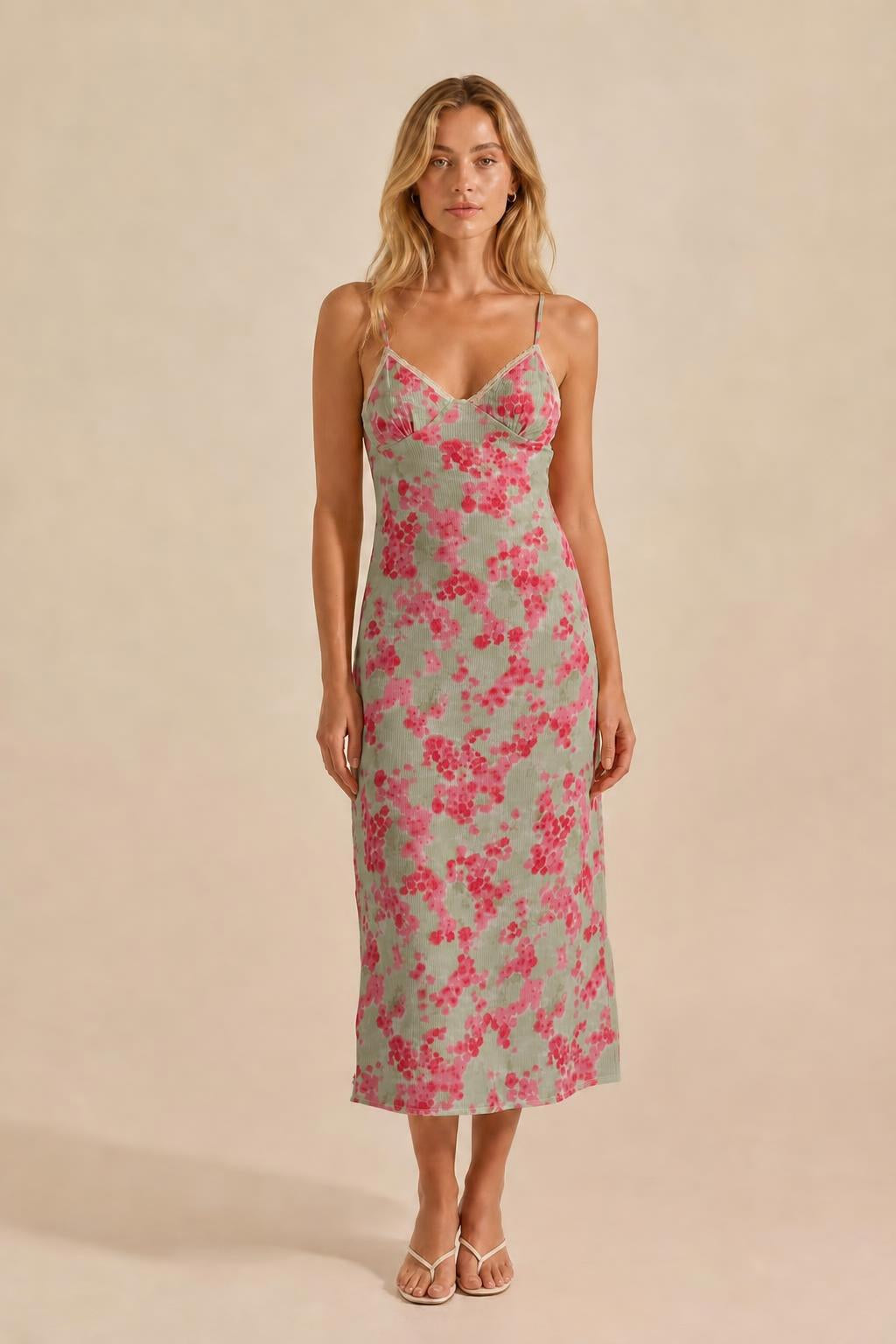 Front view of sage green floral midi slip dress