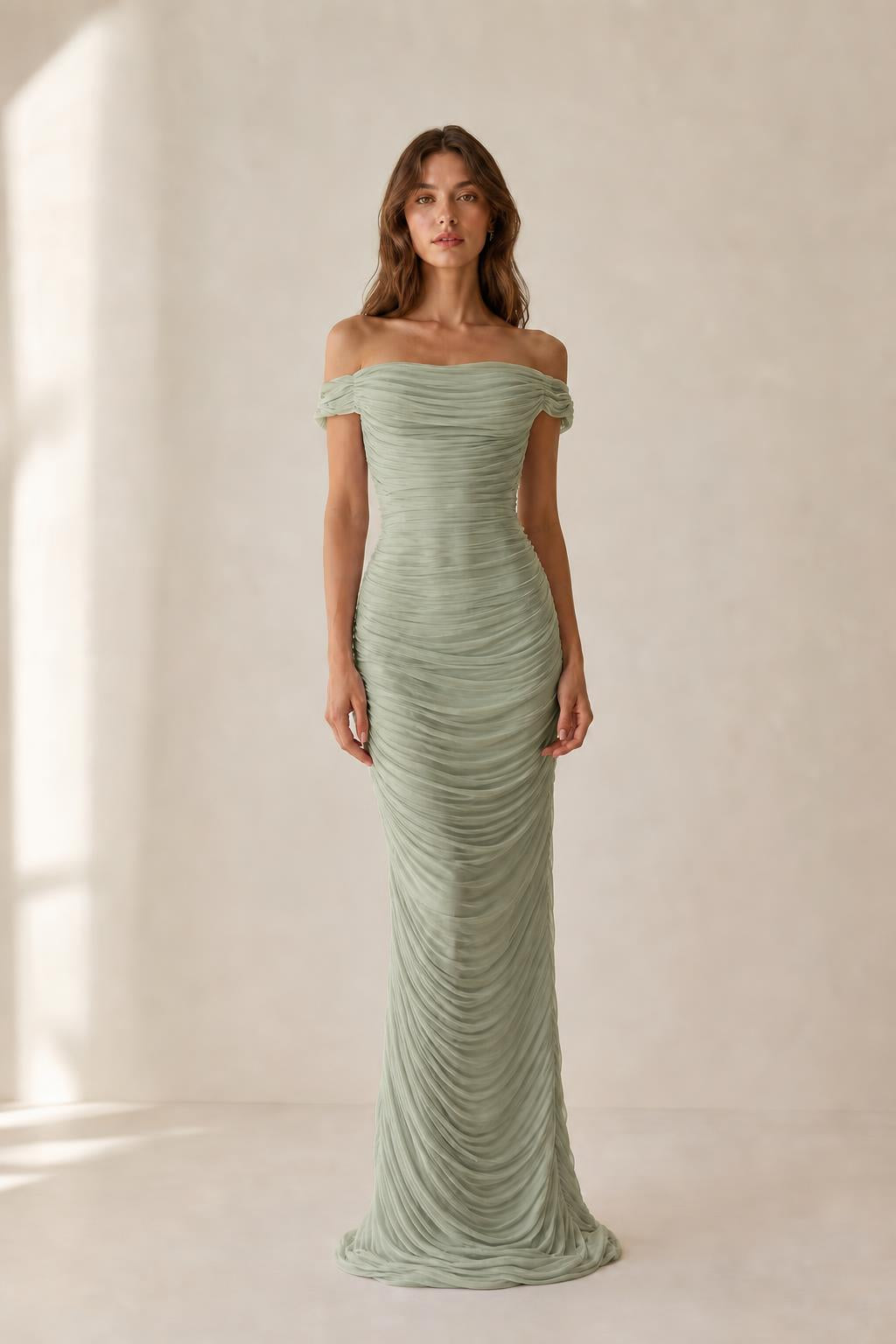Front view of sage green off-the-shoulder ruched evening dress