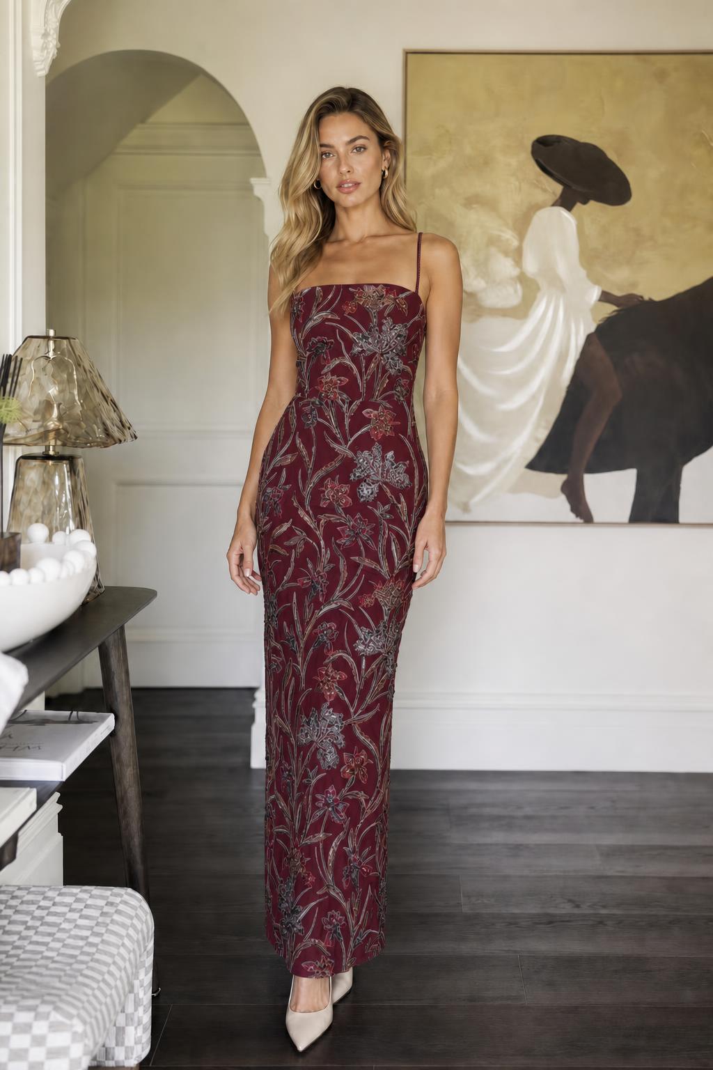 Model wearing burgundy floral beaded maxi dress variant