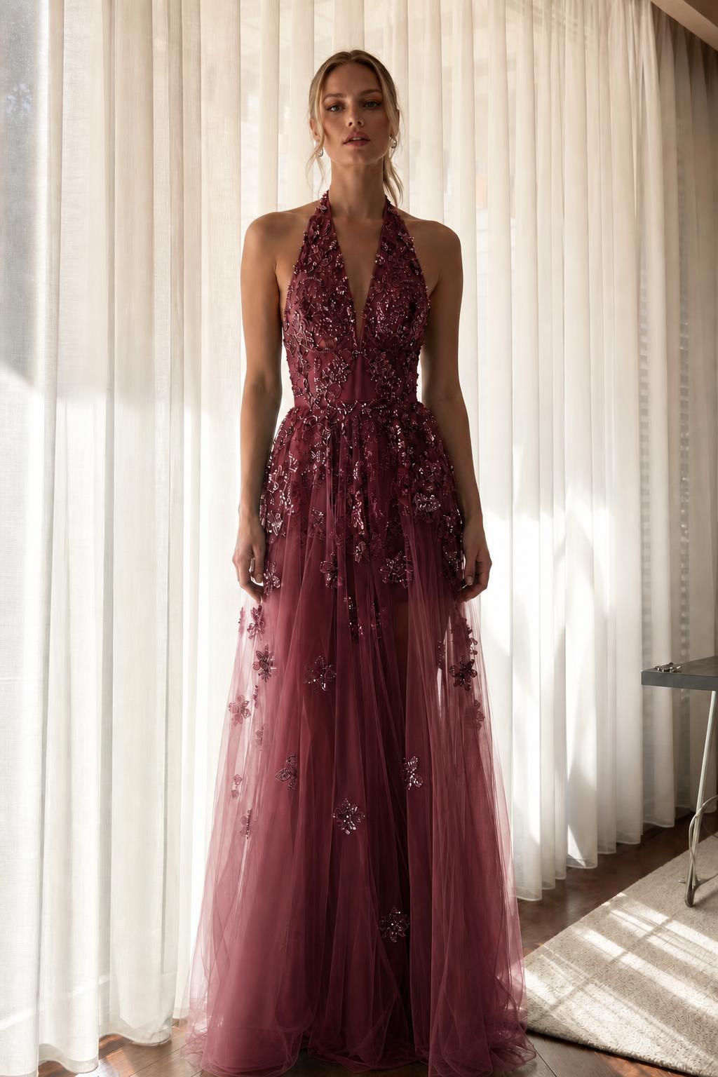 Front view of burgundy embroidered halter evening dress