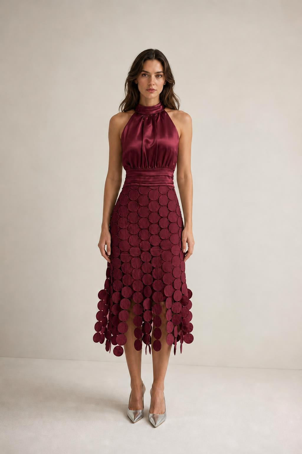 Front view of burgundy satin halter neck midi dress