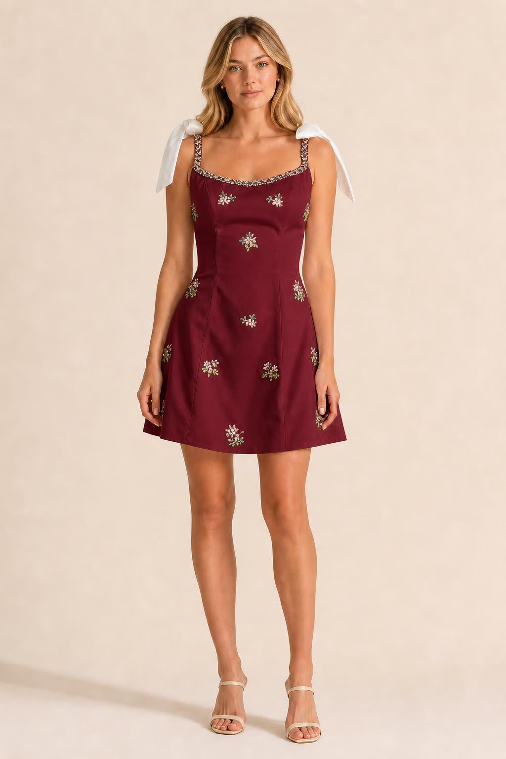 Front view of burgundy embellished mini dress