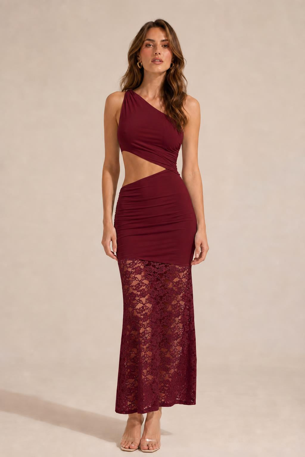 Front view of model wearing burgundy one-shoulder cutout lace maxi dress