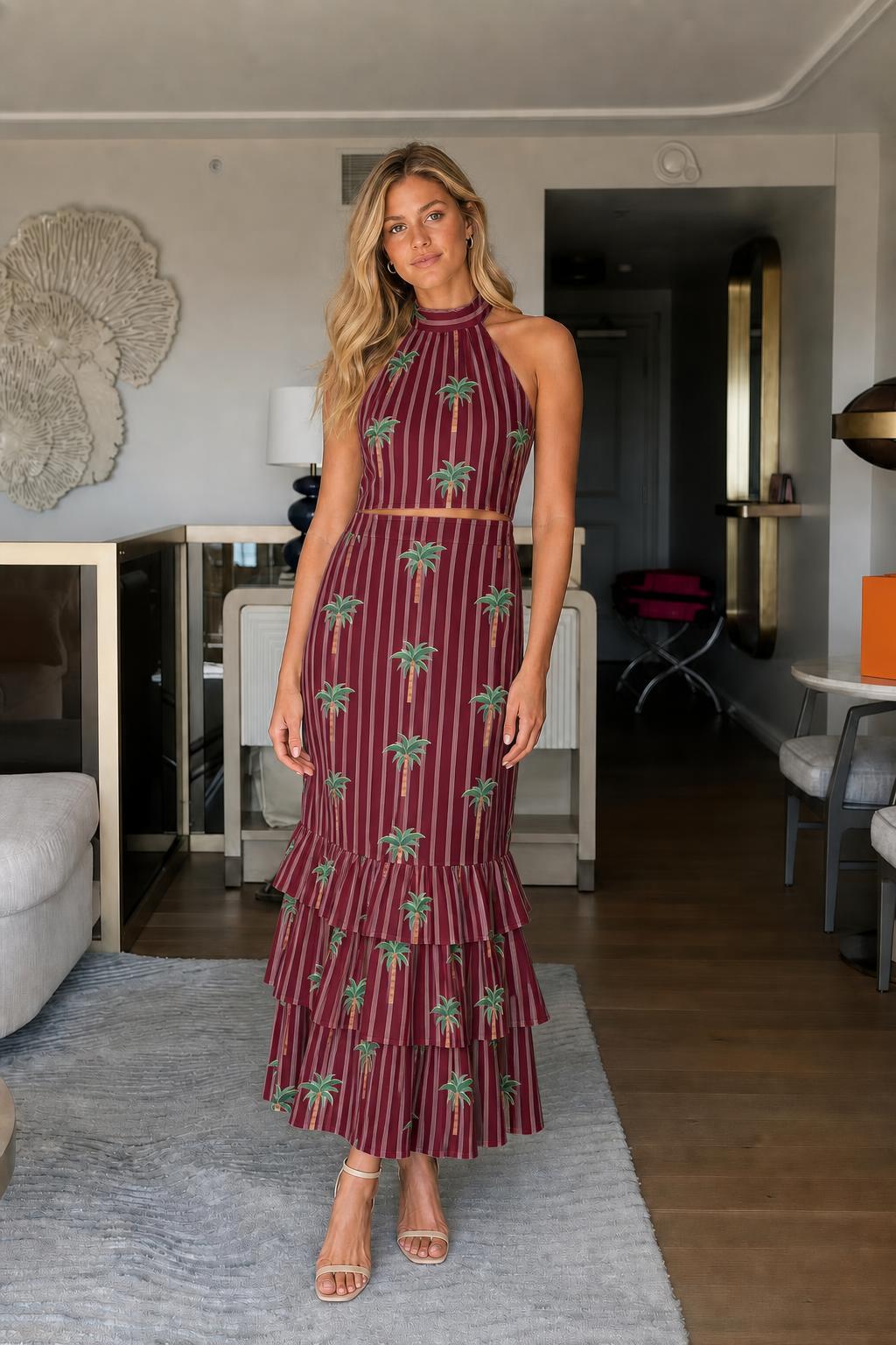 Model wearing burgundy palm tree print two-piece set
