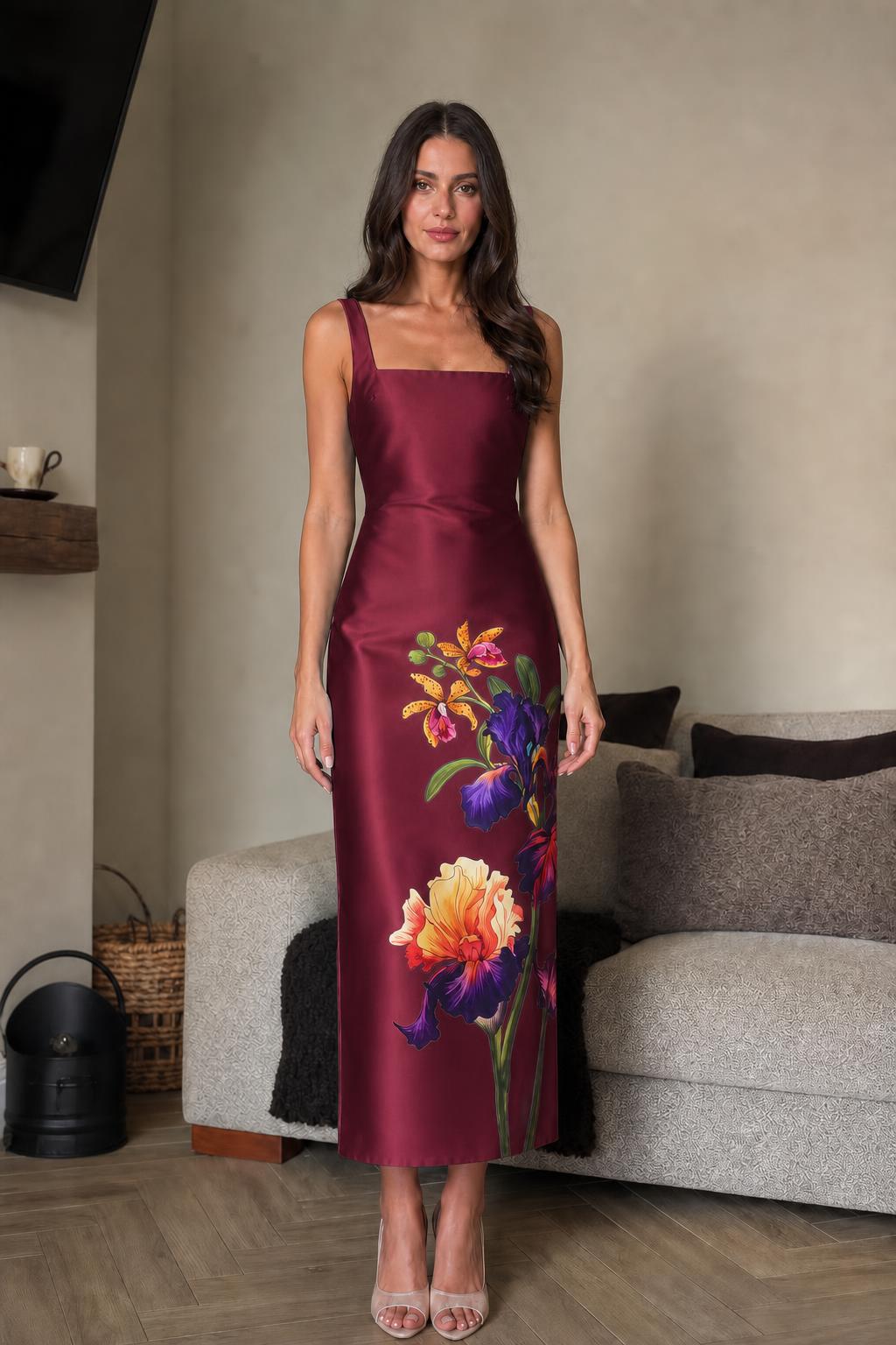 Front view of burgundy floral midi dress on model