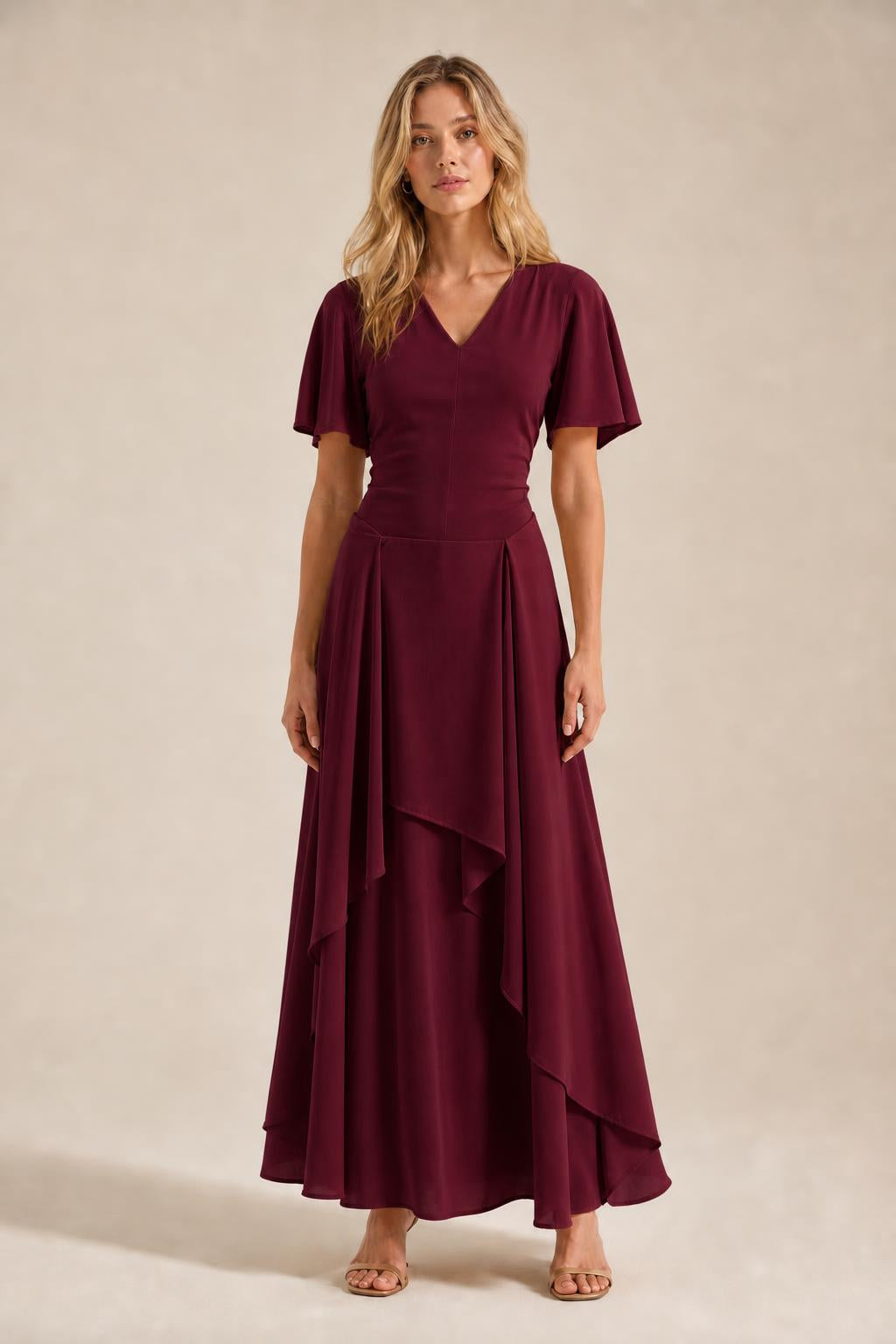 Front view of model wearing burgundy V-neck flutter sleeve maxi dress