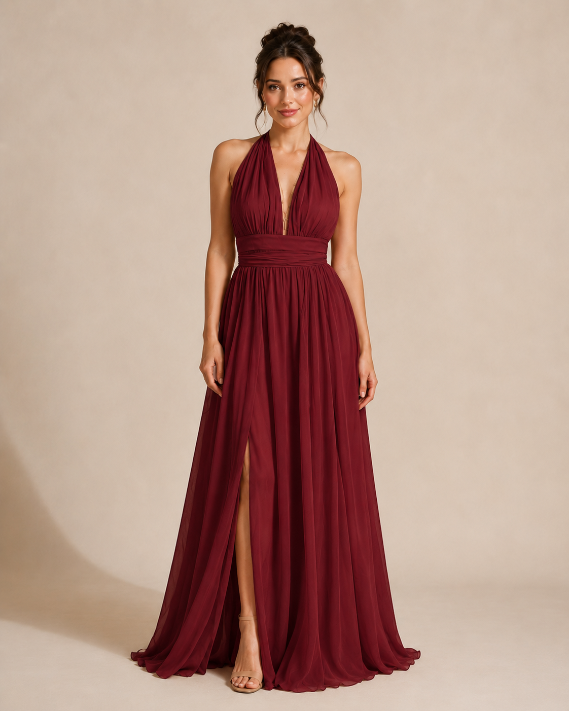 Full-length front view of burgundy halter maxi dress with deep plunge neckline