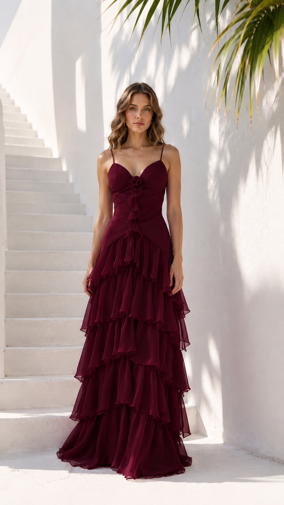 Front view of burgundy sweetheart neckline maxi dress with layered ruffles
