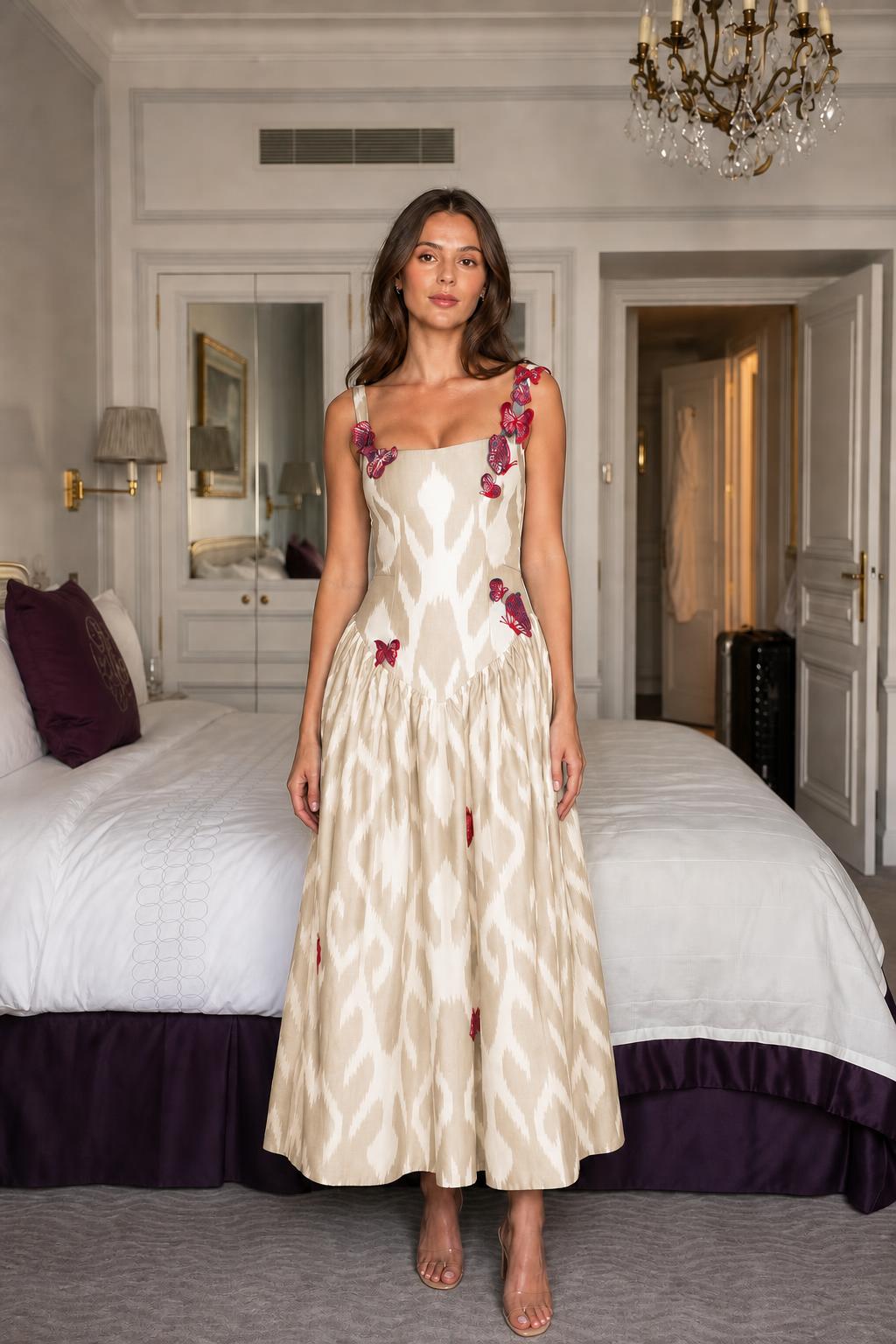 Model wearing beige ikat print midi dress