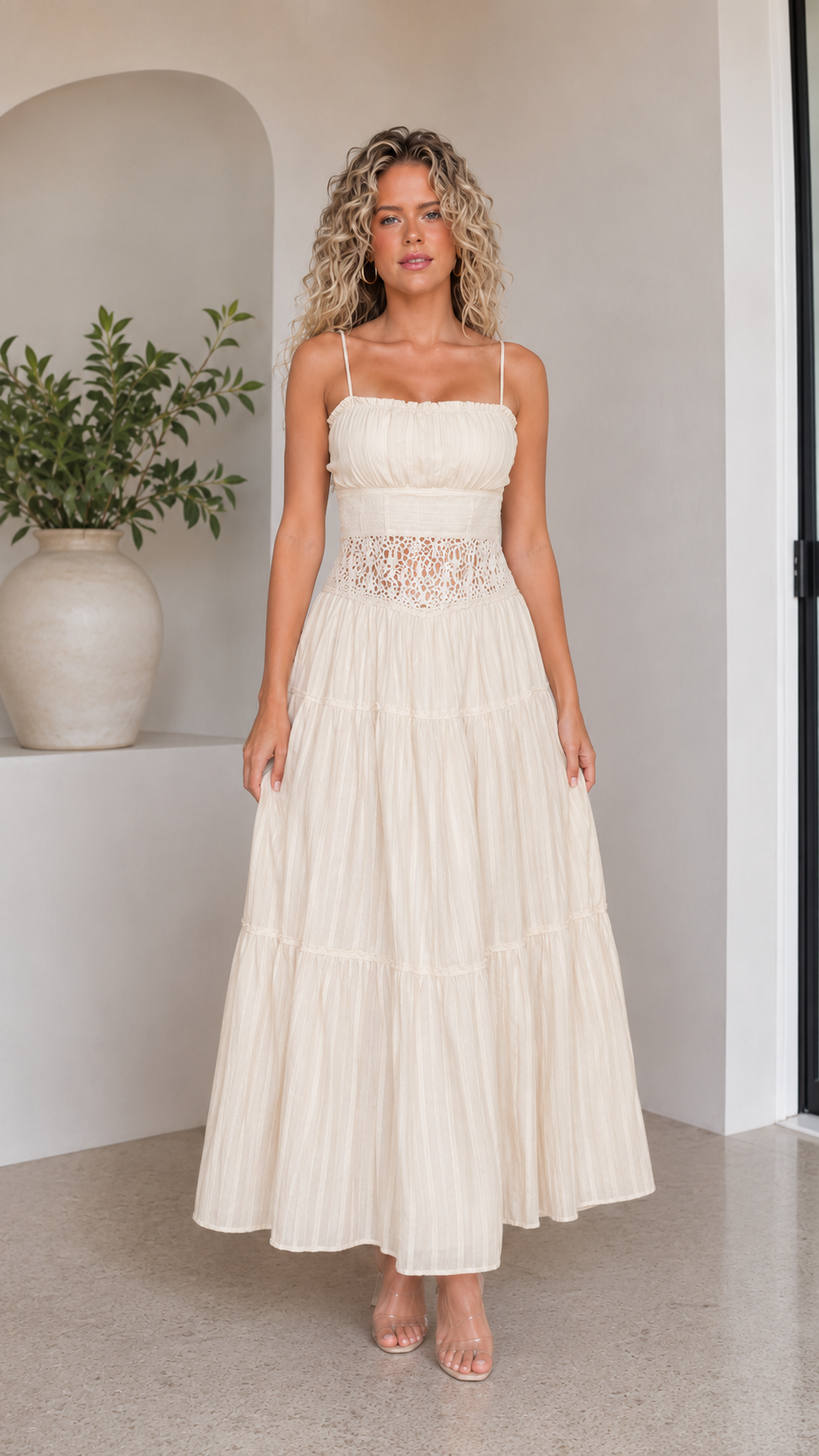 Front view of cream tiered maxi dress with textured skirt and lace-look waist