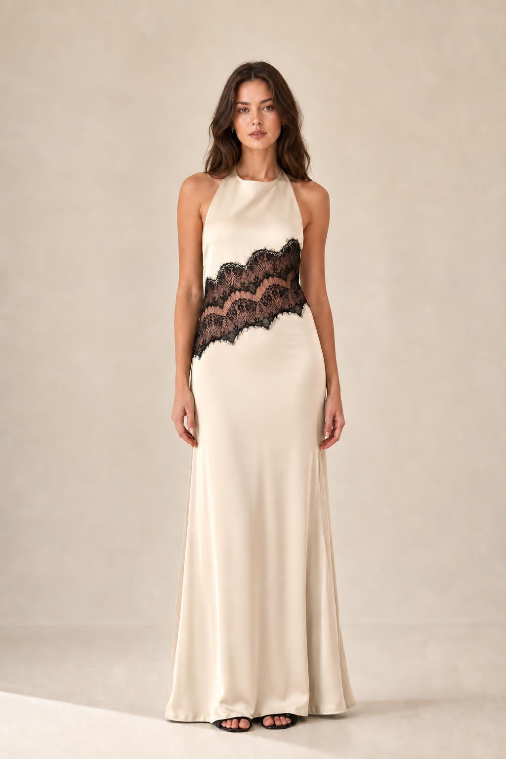 Front view of champagne halter neck maxi dress with lace insert