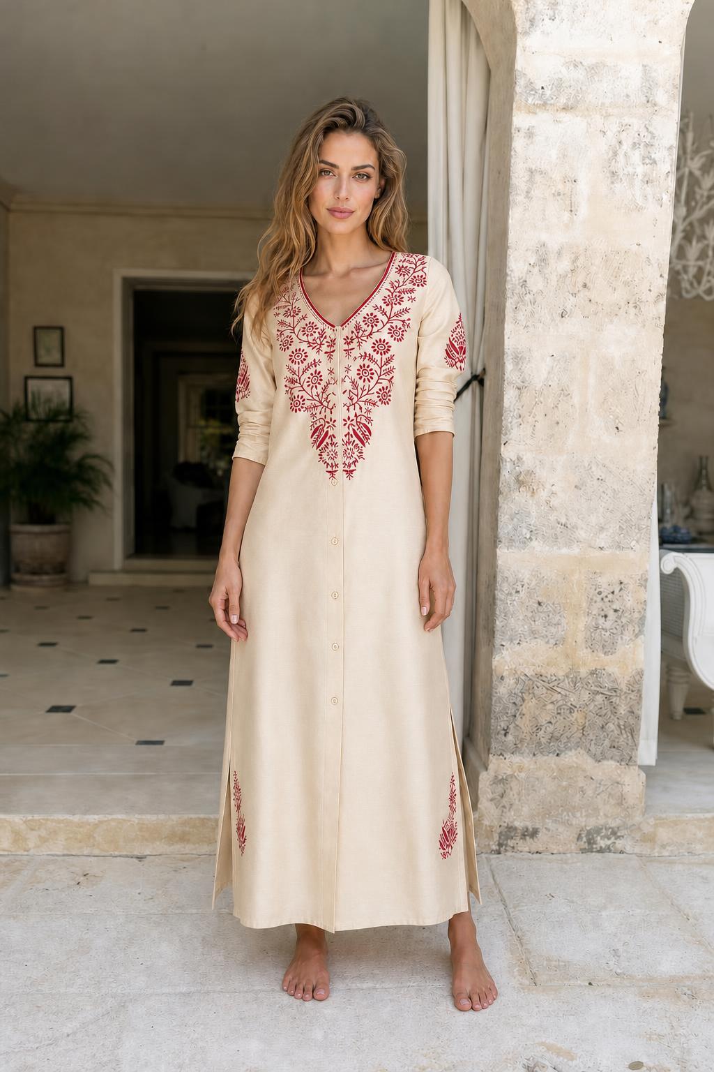 Model wearing beige embroidered maxi dress