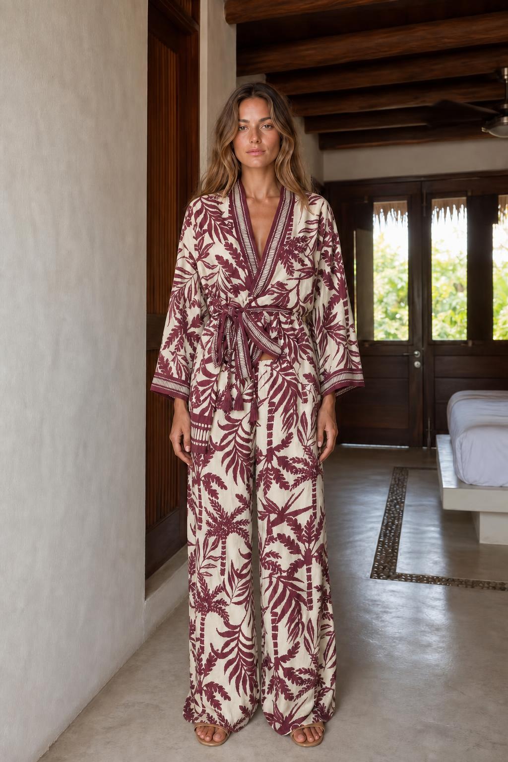 Front view of beige floral wrap jumpsuit