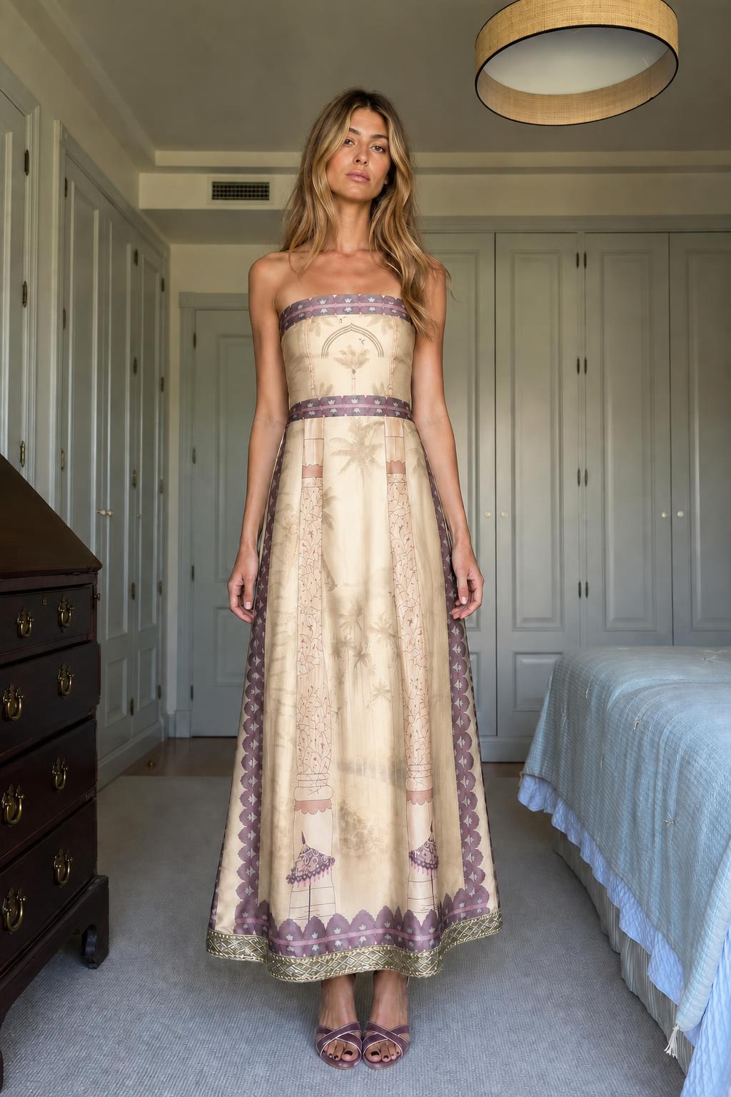 Model wearing Champagne strapless maxi dress