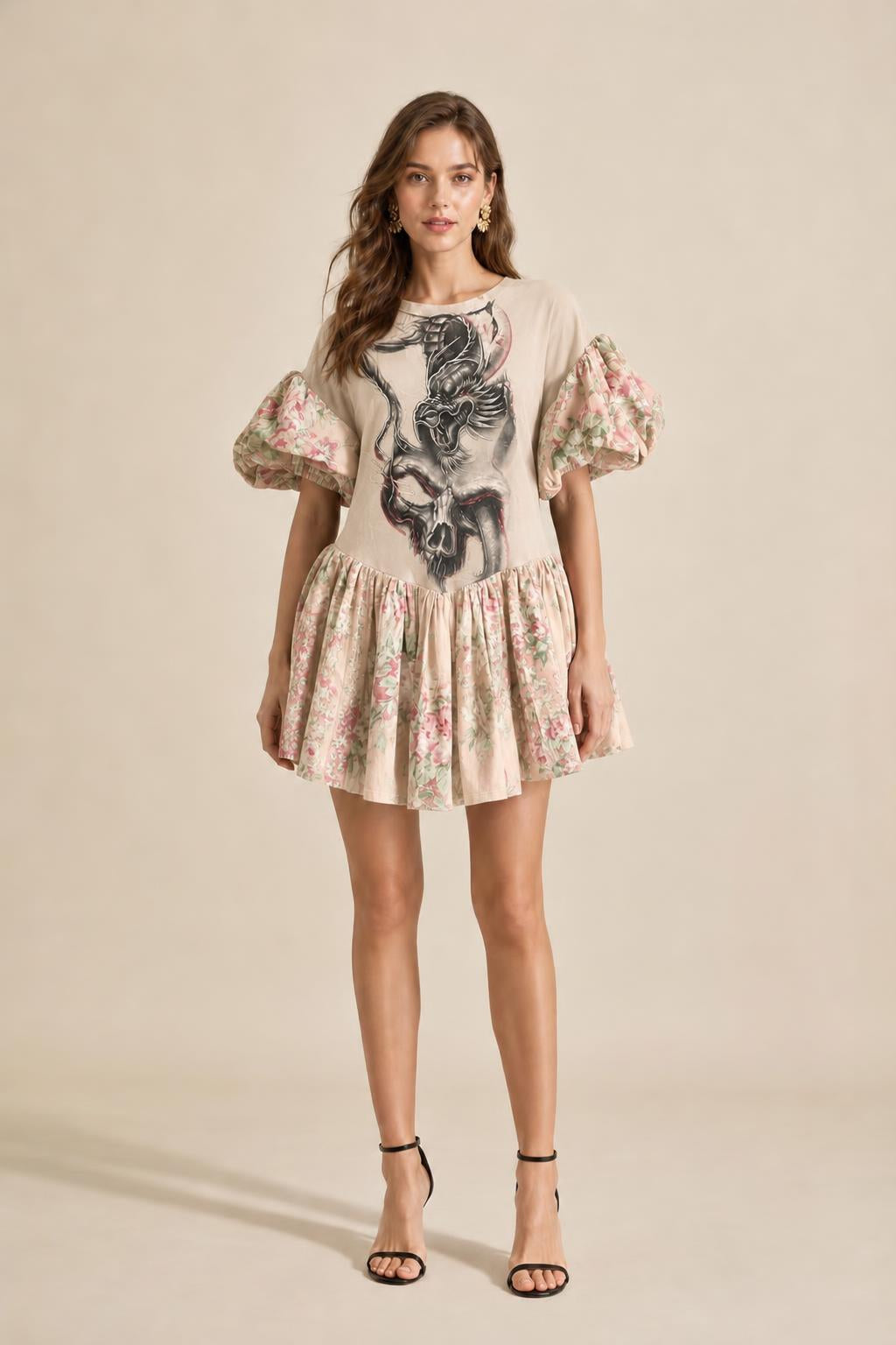 Model wearing beige color variant of graphic puff sleeve mini dress