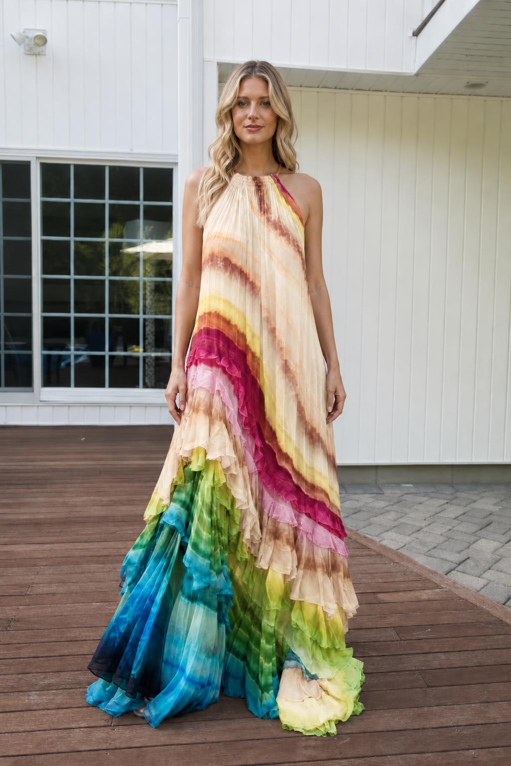 Model wearing pastel cream base rainbow gradient maxi dress