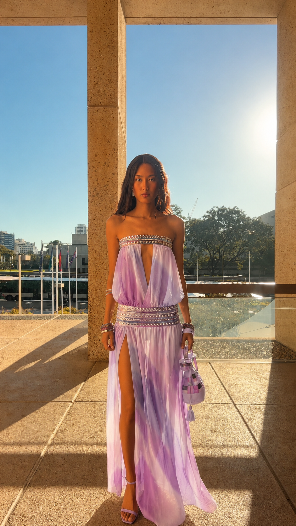 Front view of lavender strapless cutout maxi dress with embellished trim and high slit